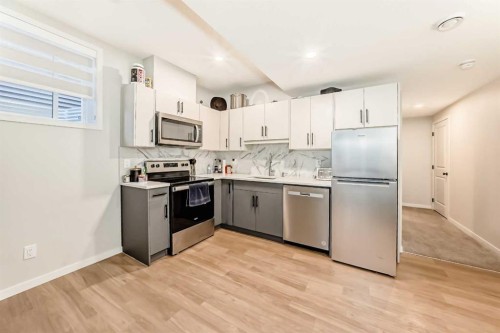 535 Tekarra Drive Nw, Calgary, AB - Indoor Photo Showing Kitchen With Stainless Steel Kitchen