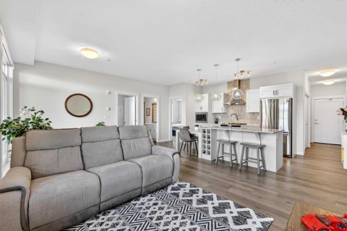 218-30 Walgrove Walk Se, Calgary, AB - Indoor Photo Showing Living Room