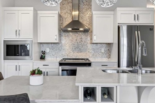 218-30 Walgrove Walk Se, Calgary, AB - Indoor Photo Showing Kitchen With Stainless Steel Kitchen With Double Sink With Upgraded Kitchen