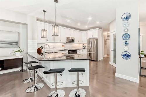 335 Morningside Crescent Sw, Airdrie, AB - Indoor Photo Showing Kitchen With Stainless Steel Kitchen With Upgraded Kitchen