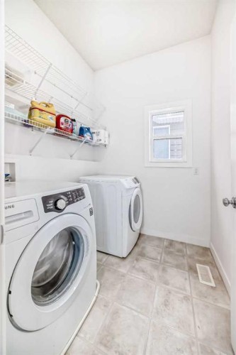 19 Valley Pointe Way Nw, Calgary, AB - Indoor Photo Showing Laundry Room