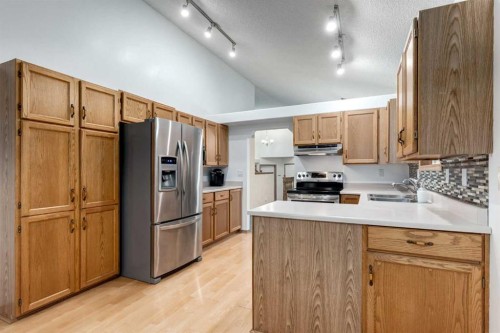26 Somercrest Circle Sw, Calgary, AB - Indoor Photo Showing Kitchen With Double Sink