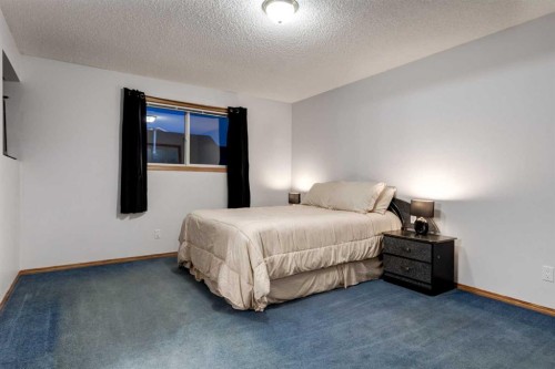 26 Somercrest Circle Sw, Calgary, AB - Indoor Photo Showing Bedroom