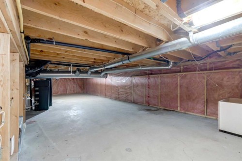 26 Somercrest Circle Sw, Calgary, AB - Indoor Photo Showing Basement