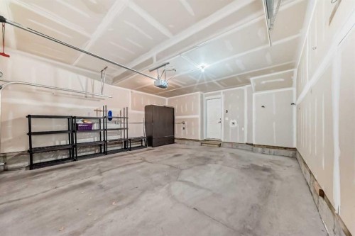 238 Panatella Nw, Calgary, AB - Indoor Photo Showing Garage