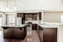 238 Panatella Nw, Calgary, AB  - Indoor Photo Showing Kitchen With Upgraded Kitchen 