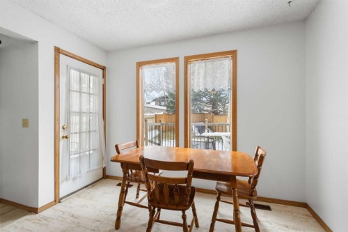 132 Scenic Cove Circle Nw, Calgary, AB - Indoor Photo Showing Dining Room