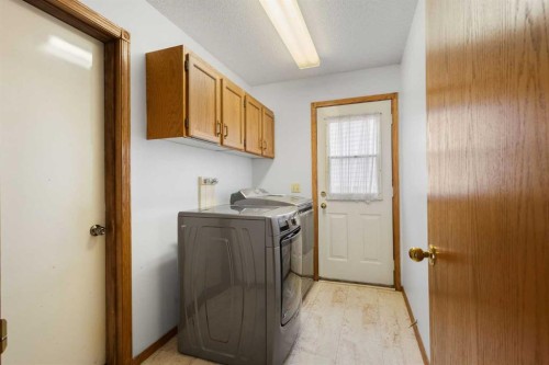 132 Scenic Cove Circle Nw, Calgary, AB - Indoor Photo Showing Laundry Room