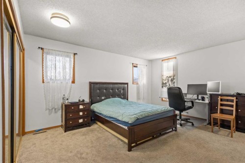 132 Scenic Cove Circle Nw, Calgary, AB - Indoor Photo Showing Bedroom