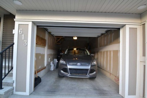 613 Hillcrest Road Sw, Airdrie, AB -  Photo Showing Garage