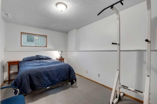 192 Rivercrest Close Se, Calgary, AB - Indoor Photo Showing Bedroom