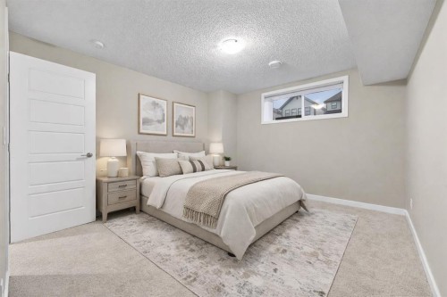 295 Masters Row Se, Calgary, AB - Indoor Photo Showing Bedroom