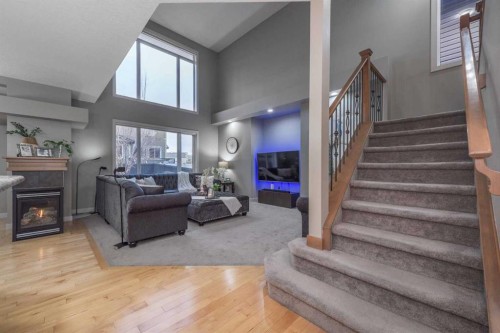 76 Evanspark Circle Nw, Calgary, AB - Indoor With Fireplace