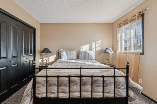 110 Eversyde Common Sw, Calgary, AB - Indoor Photo Showing Bedroom