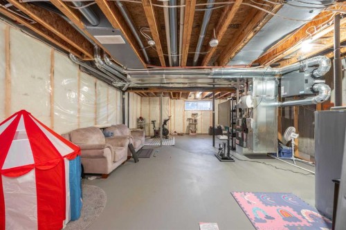 1027 Lanark Boulevard Se, Airdrie, AB - Indoor Photo Showing Basement