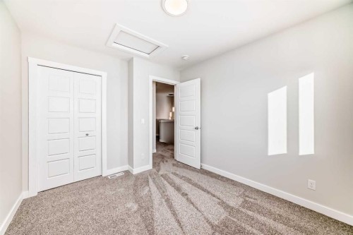 241 Bridgeport Gate, Chestermere, AB - Indoor Photo Showing Other Room