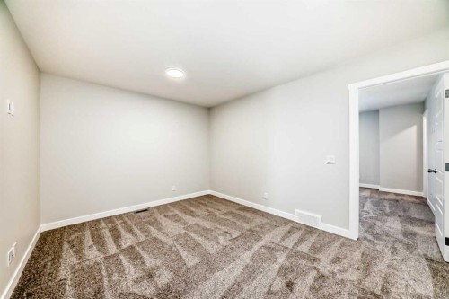 241 Bridgeport Gate, Chestermere, AB - Indoor Photo Showing Other Room