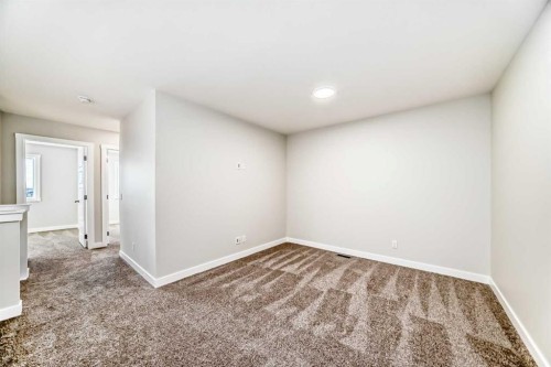 241 Bridgeport Gate, Chestermere, AB - Indoor Photo Showing Other Room