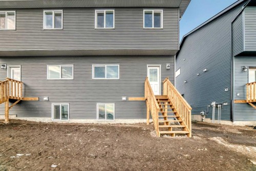 241 Bridgeport Gate, Chestermere, AB - Outdoor With Exterior