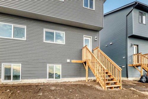 241 Bridgeport Gate, Chestermere, AB - Outdoor With Exterior