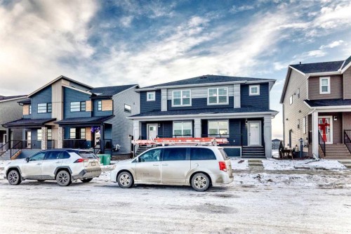 241 Bridgeport Gate, Chestermere, AB - Outdoor With Facade