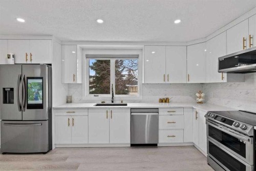 6120 18 Avenue Ne, Calgary, AB - Indoor Photo Showing Kitchen With Upgraded Kitchen