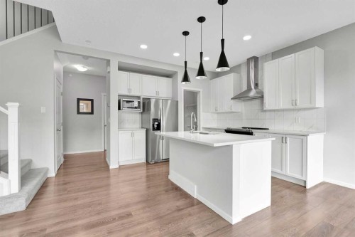 106 Lucas Crescent Nw, Calgary, AB - Indoor Photo Showing Kitchen With Upgraded Kitchen