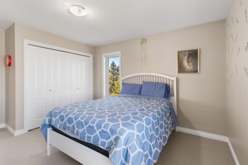 149 Sharp Hill Drive, Rural Rocky View County, AB - Indoor Photo Showing Bedroom