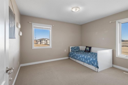 149 Sharp Hill Drive, Rural Rocky View County, AB - Indoor Photo Showing Bedroom
