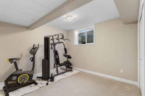 149 Sharp Hill Drive, Rural Rocky View County, AB - Indoor Photo Showing Gym Room