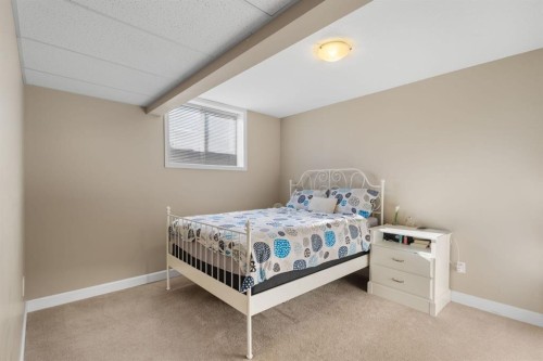 149 Sharp Hill Drive, Rural Rocky View County, AB - Indoor Photo Showing Bedroom