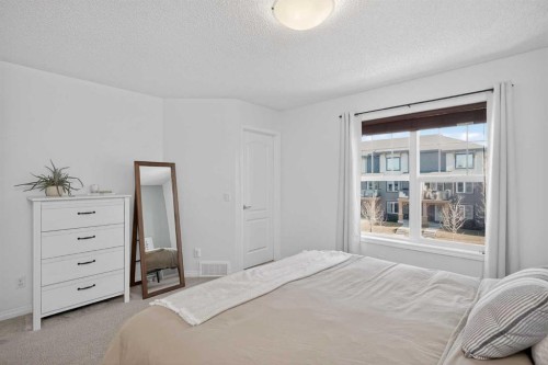 61 Auburn Meadows View Se, Calgary, AB - Indoor Photo Showing Bedroom