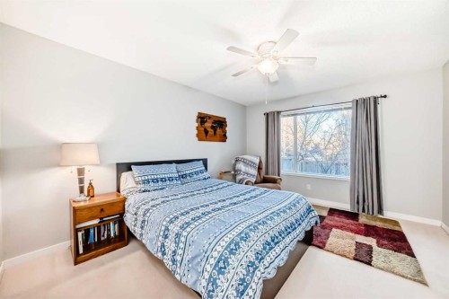 76 Tuscany Way Nw, Calgary, AB - Indoor Photo Showing Bedroom