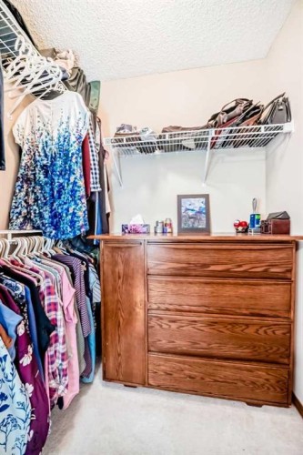 76 Tuscany Way Nw, Calgary, AB - Indoor With Storage