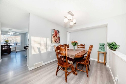 76 Tuscany Way Nw, Calgary, AB - Indoor Photo Showing Dining Room