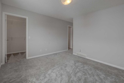 16 Fireside Way, Cochrane, AB - Indoor Photo Showing Other Room