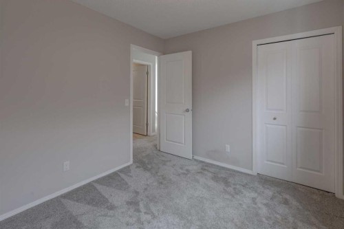16 Fireside Way, Cochrane, AB - Indoor Photo Showing Other Room