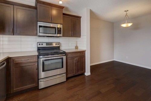 16 Fireside Way, Cochrane, AB - Indoor Photo Showing Kitchen With Stainless Steel Kitchen