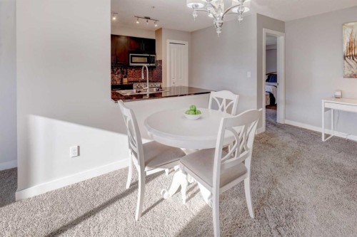 3301-403 Mackenzie Way Sw, Airdrie, AB - Indoor Photo Showing Dining Room