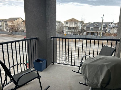 3301-403 Mackenzie Way Sw, Airdrie, AB - Outdoor With Balcony With Exterior