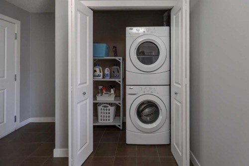 3301-403 Mackenzie Way Sw, Airdrie, AB - Indoor Photo Showing Laundry Room