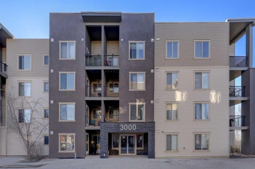 3301-403 Mackenzie Way Sw, Airdrie, AB - Outdoor With Balcony With Facade
