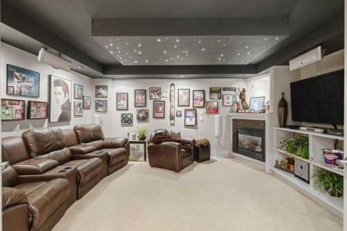 247 St Moritz Drive Sw, Calgary, AB - Indoor With Fireplace