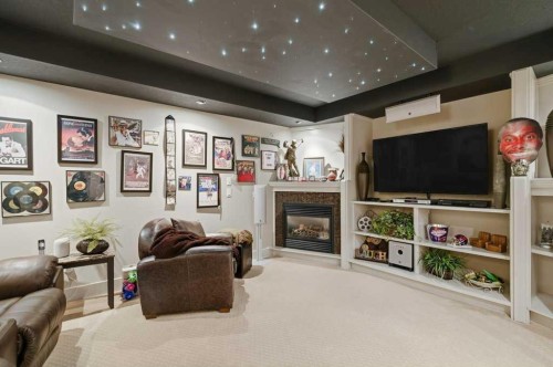 247 St Moritz Drive Sw, Calgary, AB - Indoor With Fireplace