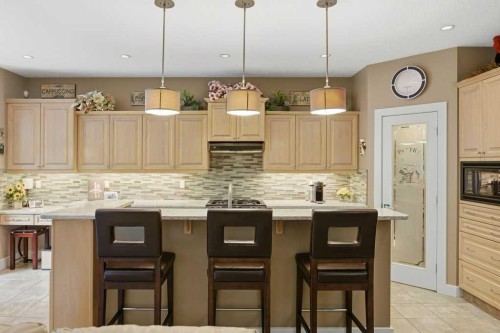 247 St Moritz Drive Sw, Calgary, AB - Indoor Photo Showing Kitchen With Upgraded Kitchen