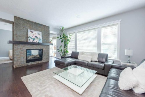 67 Auburn Sound Manor Se, Calgary, AB - Indoor Photo Showing Living Room With Fireplace
