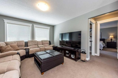 67 Auburn Sound Manor Se, Calgary, AB - Indoor Photo Showing Living Room