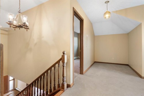 39 Coach Gate Way Sw, Calgary, AB - Indoor Photo Showing Other Room