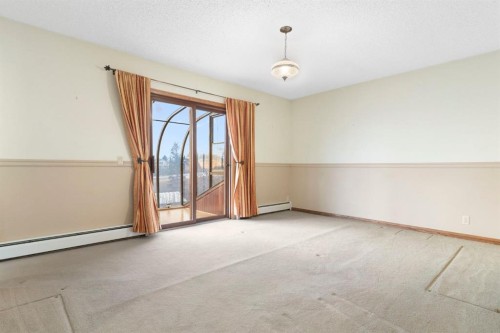 39 Coach Gate Way Sw, Calgary, AB - Indoor Photo Showing Other Room