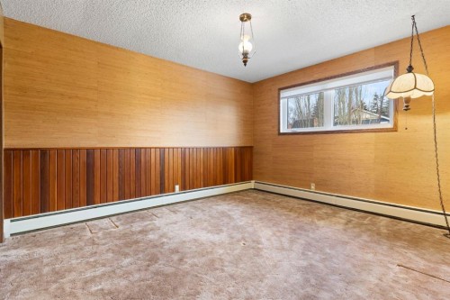 39 Coach Gate Way Sw, Calgary, AB - Indoor Photo Showing Other Room